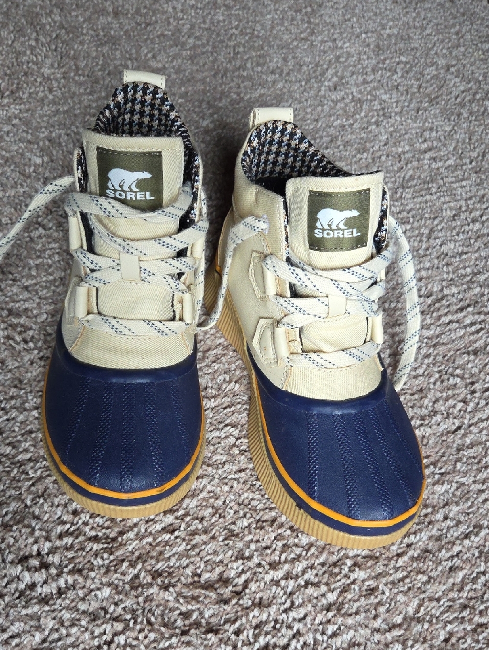 Sorel Two-Tone Duck Boots in Navy and Cream with Tan Accents